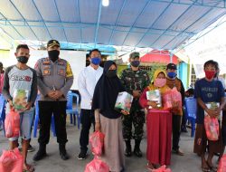 Bupati Bersama Kapolres dan Dandim 1510 Bagikan Sembako Kepada Warga Sula